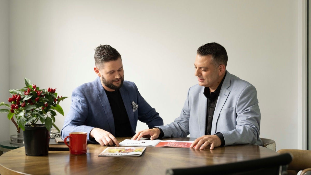 broker talking to his client